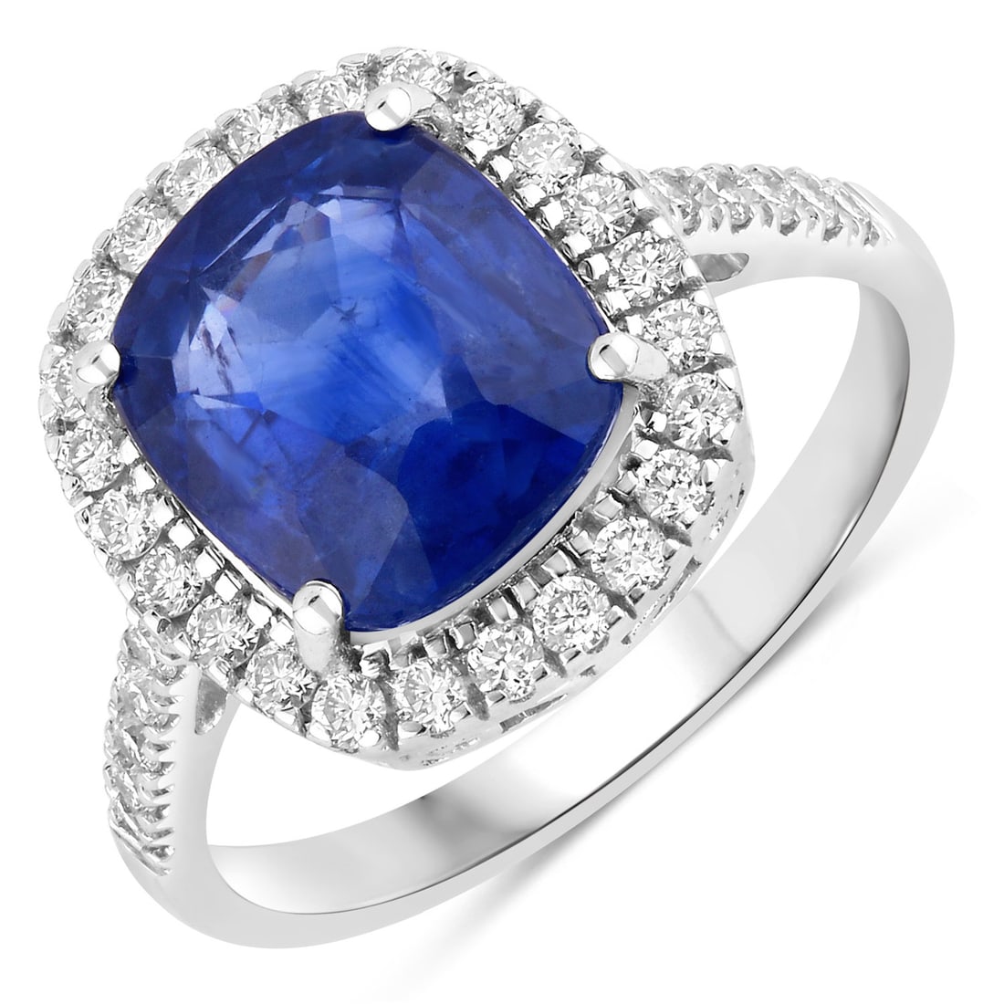 18KT White Gold 4.35ct Blue Sapphire and Diamond Ring: 18K White Gold Cushion-Cut Blue Sapphire and Diamond Halo Ring Elevate your collection with this exquisite halo-style ring, crafted in 18K white gold and showcasing a vivid cushion-cut natural blue sa