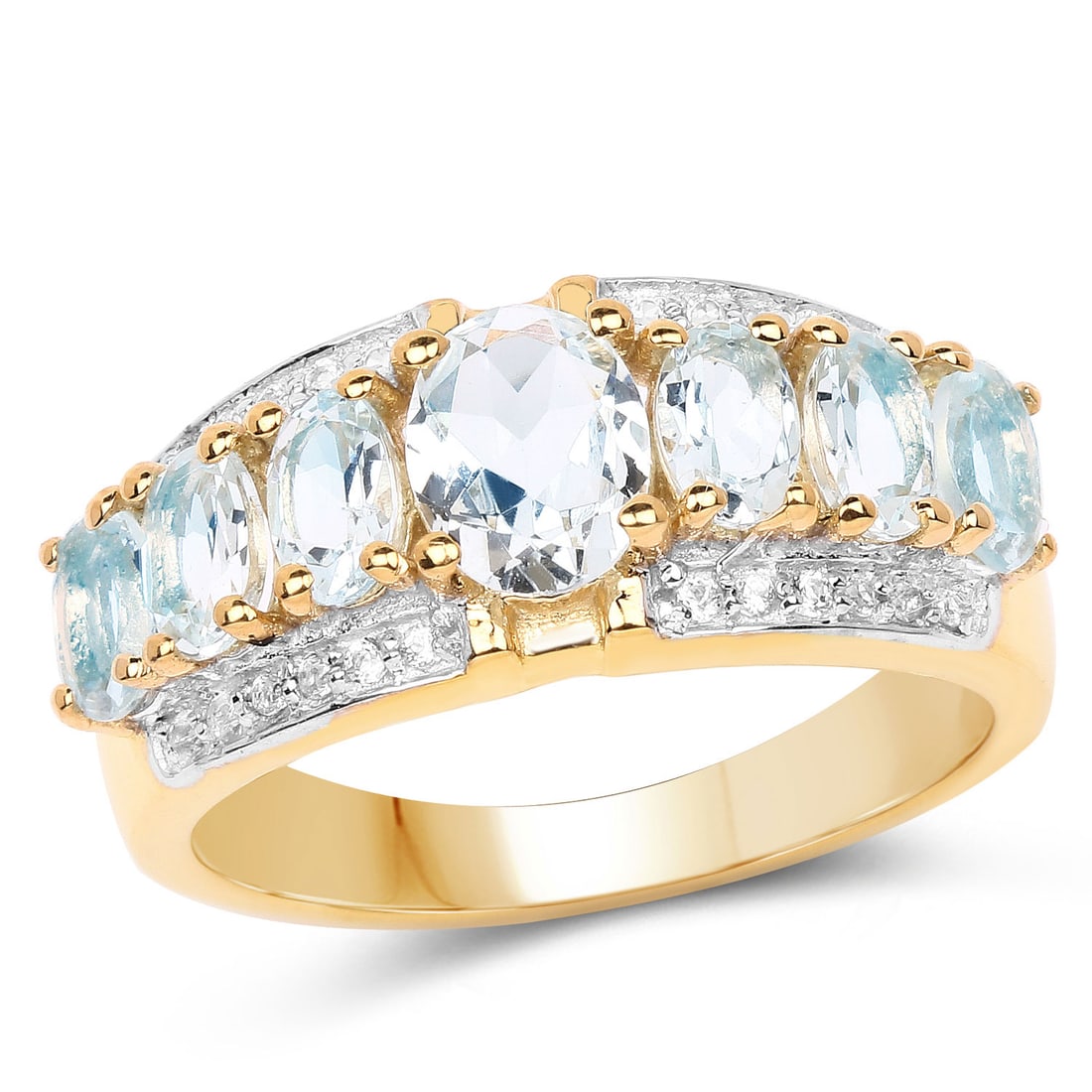 18KT Yellow Gold Plated 1.93ctw Aquamarine and Diamond Ring: Natural aquamarines creates a soft blue spread across this 18K yellow gold–plated .925 sterling silver ring, centered by a single 7×5?mm oval stone (0.60?ctw) and framed by six 5×3?mm ovals (1.20?