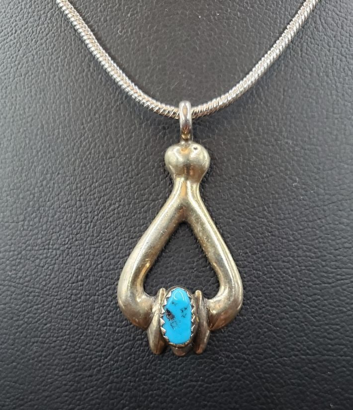 Ladies Natural Turquoise .925 Solid Silver Pendant: Oval cabochon cut mounted in solid .925 sterling silver. Weighs 11.5 total grams. Includes 20" chain