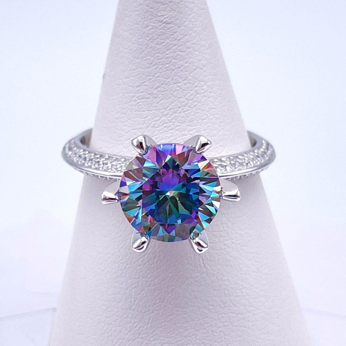 Plated 14KT Gold 3 Ct VVs1 Russian Simulated Alexandrite Ring: This Alexandrite 3 Ct Lab Created Color Change Stone is a VVs1 Eye-Clean Fine Round Cut Measuring 9mm. The color spectrum ranges from beautiful greens, blues and pinks depending on the light and the a