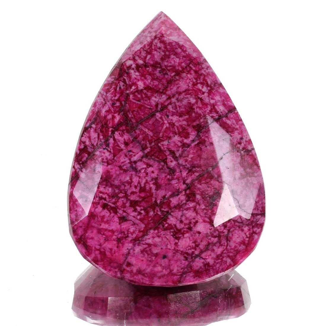 Magnificent Huge Museum Size 1150 Ct Certified Red Ruby Solitaire: Magnificent Huge 1150 Ct Certified Natural Red Ruby Solitaire. Fine pear cut measuring 90 x 62 x 25 mm. Has a vivid even red hue with a fine finish and polish. Species: Corundum. Natural opaque. Pleas