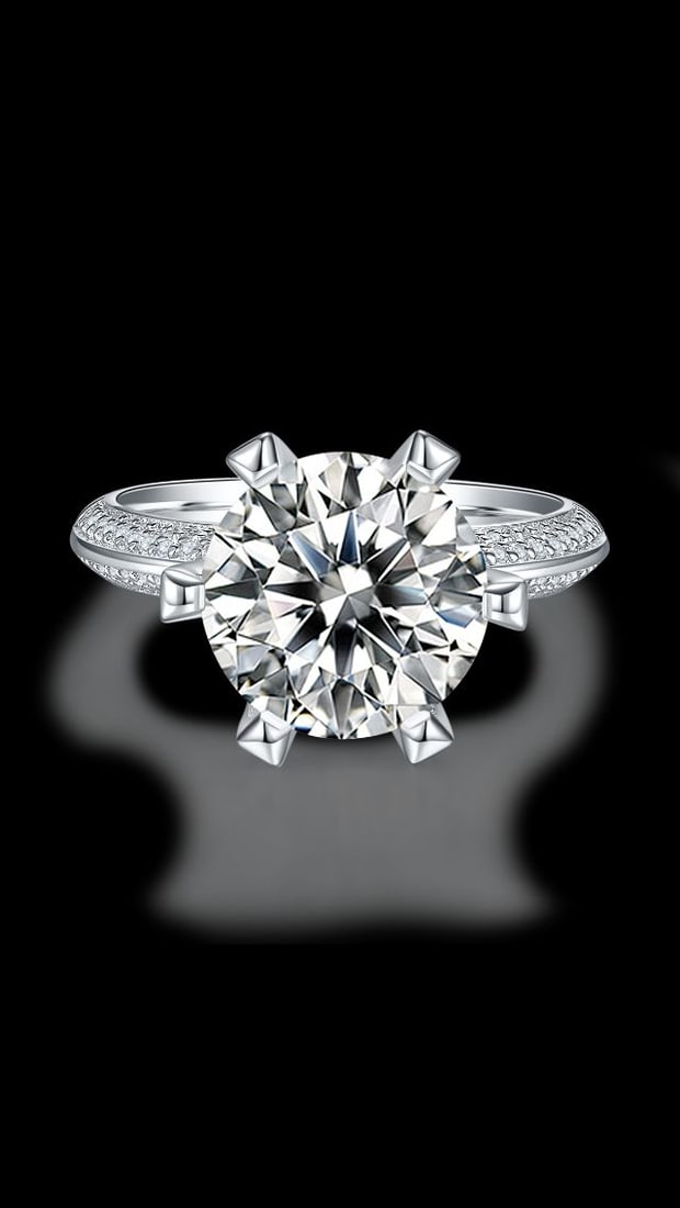 Sparkling 5 Ct VVS1 White F-G Fire Moissanite Ring: This Fire Moissanite is a VVS1 Brilliant Round Cut. The Color is F-G with a clarity of VVS-1. Measuring approx.10.5 mm. This Fire Moissanite is near flawless and bursting out with a full spectrum of