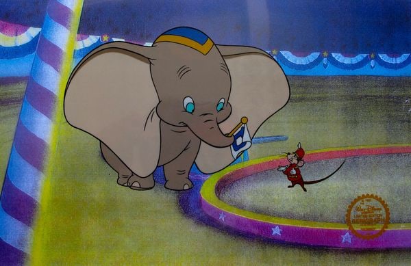Disney DUMBO Original Sericel Animation Art Cel: This is a GENUINE Original Limited Edition Serigraph Cel of DUMBO & TIMOTHY MOUSE from 1941 Walt Disney Studios – DUMBO. Disneys own artists have selected this scene from the ORIGINAL animation draw