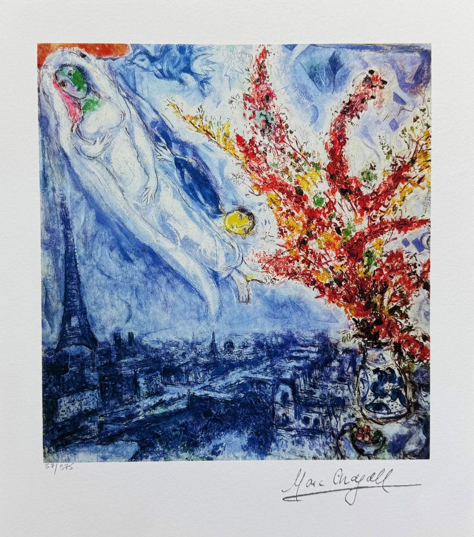 Marc Chagall FLOWERS OVER PARIS Facsimile Signed Limited Edition Giclee: This is a Marc Chagall limited edition small giclee titled FLOWERS OVER PARIS. This giclee is facsimile signed on the lower right and is pencil numbered on the lower left from an edition of 375. Paper