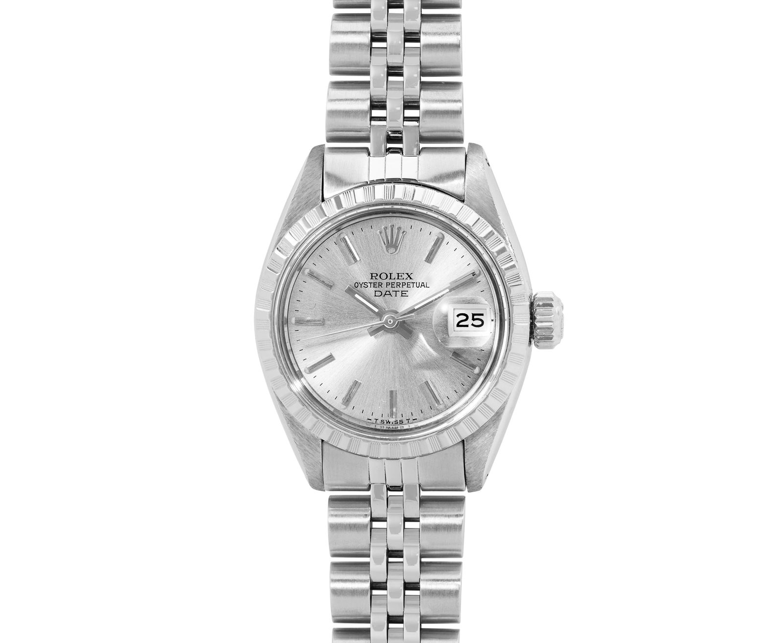Rolex Ladies Silver Index Date Wristwatch 26MM: This Lady Rolex Date watch features a silver dial with index hour markers and a custom plastic crystal, with a magnified date window. The timepiece has Rolex stainless steel engine turn bezel. The