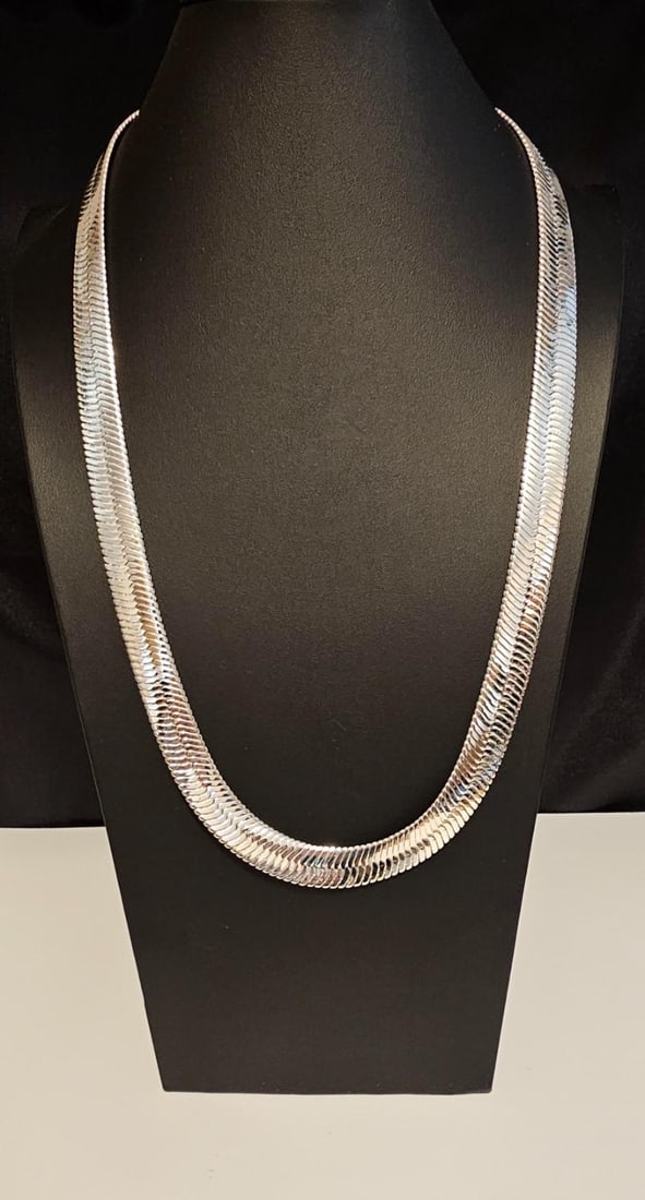 Huge 130 Gram 14 Kt Tri-Layered .925 Sterling Silver Plate Herringbone Necklace: Huge 130 Gram Tri-Layered .925 Sterling Silver Herringbone Necklace. This Fine Silver Herringbone Necklace Is A Fine Solid Cut. This necklace measures 30 inches long and a stealth 14 mm. thick. This