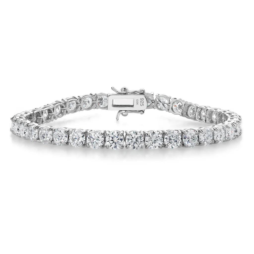 Sterling Silver 18.00ctw Moissanite Bracelet: Crafted in solid 925 sterling silver, this 7?inch link bracelet showcases a sleek 185 x 5 mm profile and a classic toggle clasp for effortless wear. The design features 36 round moissanite gemstones,