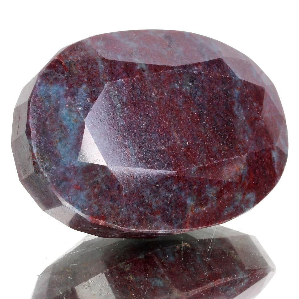 Huge 2180 Ct Certified Natural Untreated Ruby Kyanite Oval Cut Solitaire: Magnificent Huge 2180 Ct Certified Natural Untreated Red Ruby Blue Kyanite Solitaire. This Fine gemstone is a fully faceted oval cut measuring 82 x 48 x 53 mm. It has a vivid even burgundy blue hue wi