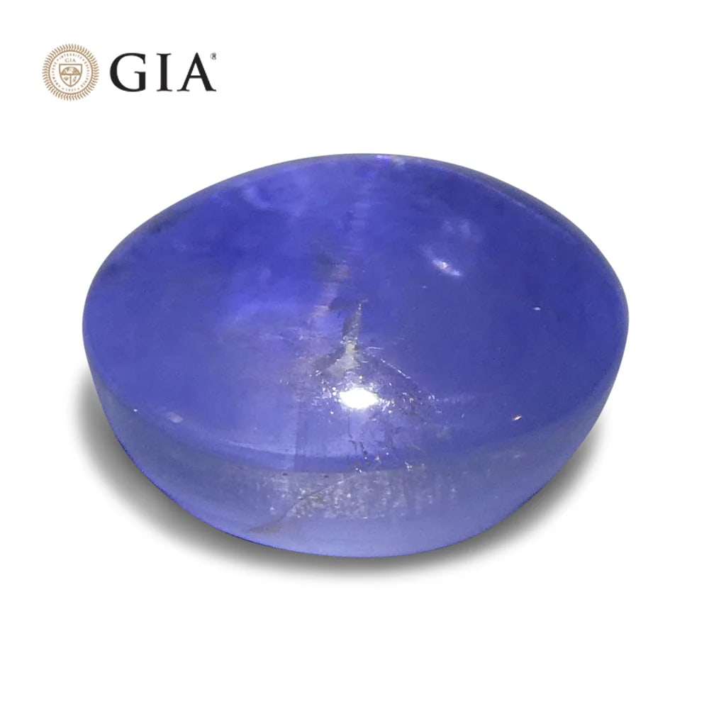 Impressive 4.75 Ct GIA Certified Natural Sapphire: Incredible 4.75 Ct Blue Star Sapphire is an oval double cabochon cut measuring 9.72 x 7.90 x 5.77 mm. Reveals a stunning hue and medium tone. Get ready for the compliments on this one! Treatment: None