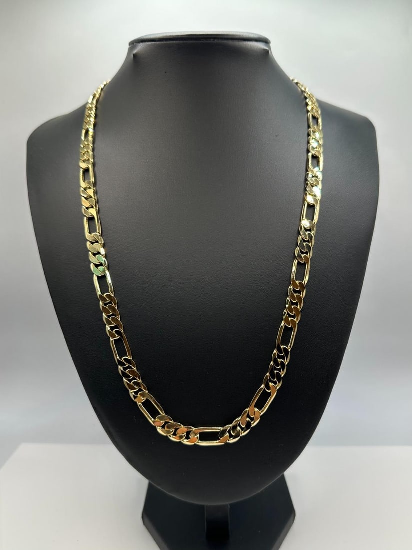 36.8 Gram 14 Kt. Gold Plate Figaro Italian Link Chain: 36.8 Gram 14 Kt Yellow Gold Plated Figaro Chain Link Necklace. This High Quality Figaro Chain Necklace Is Just Like The Pros Wear. A healthy 7 mm wide and 24" long. The to total gram Wt. is 36.8 grams