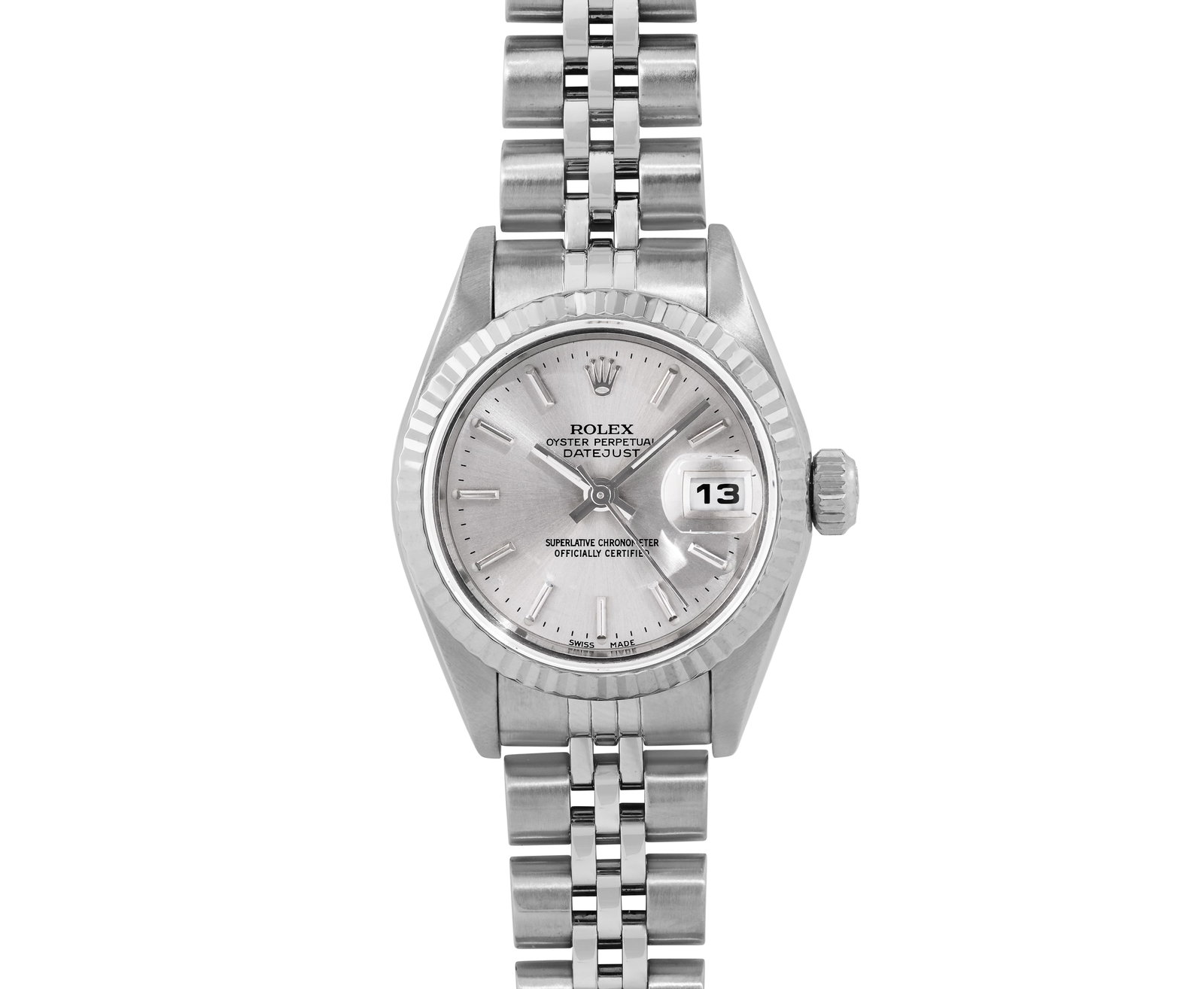 Rolex Ladies Stainless Steel Silver Index 18K White Gold Fluted Quickset Datejust Watch: This Lady Rolex Quickset Datejust watch features a silver dial with index hour markers and a sapphire crystal, with a magnified date window. The timepiece has a Rolex 18k white gold fluted bezel. The