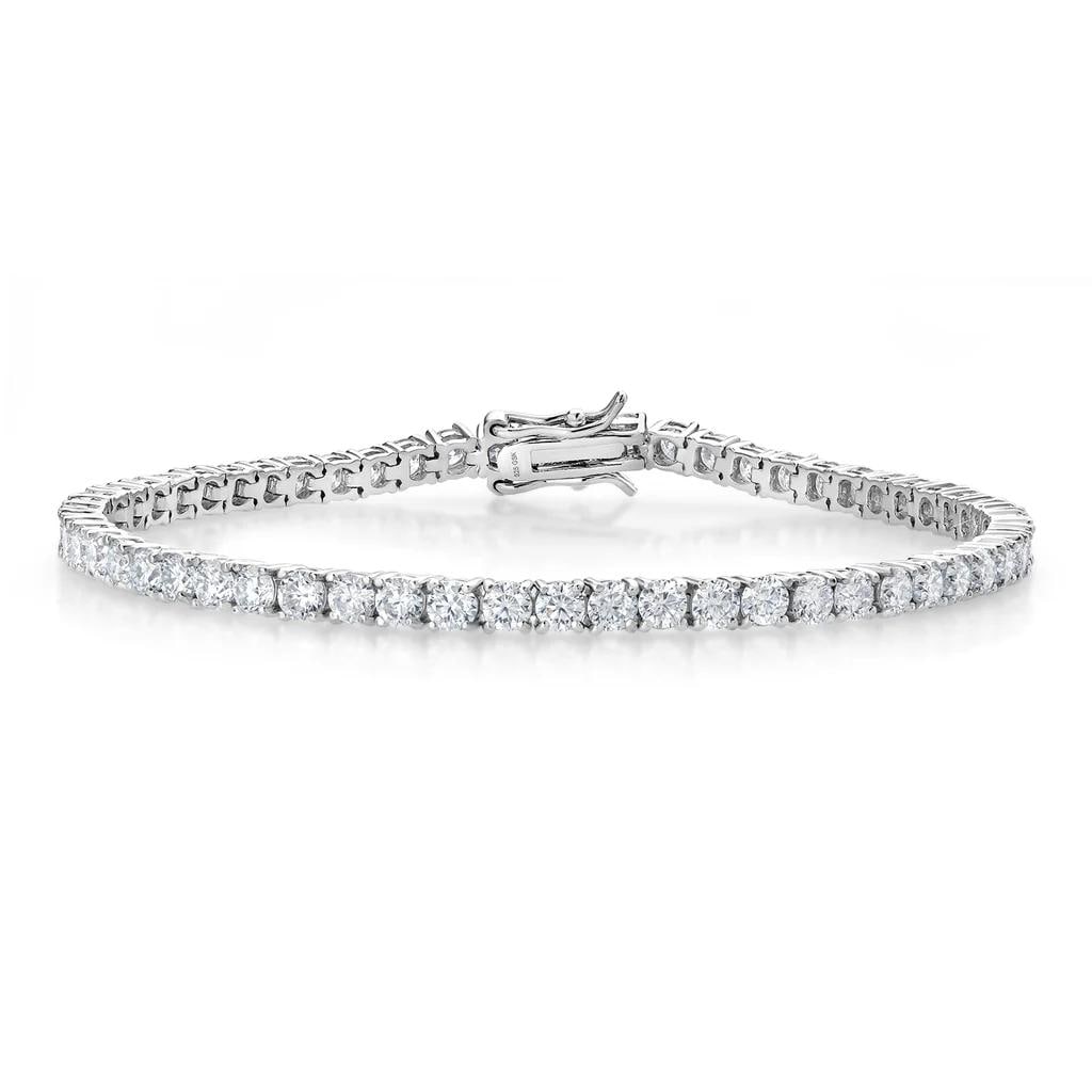 Sterling Silver 6.00ctw Moissanite Tennis Bracelet: Sterling Silver 6.00ctw Moissanite Tennis Bracelet. 3mm round moissanite stones. Bracelet length is 7.5 inches.