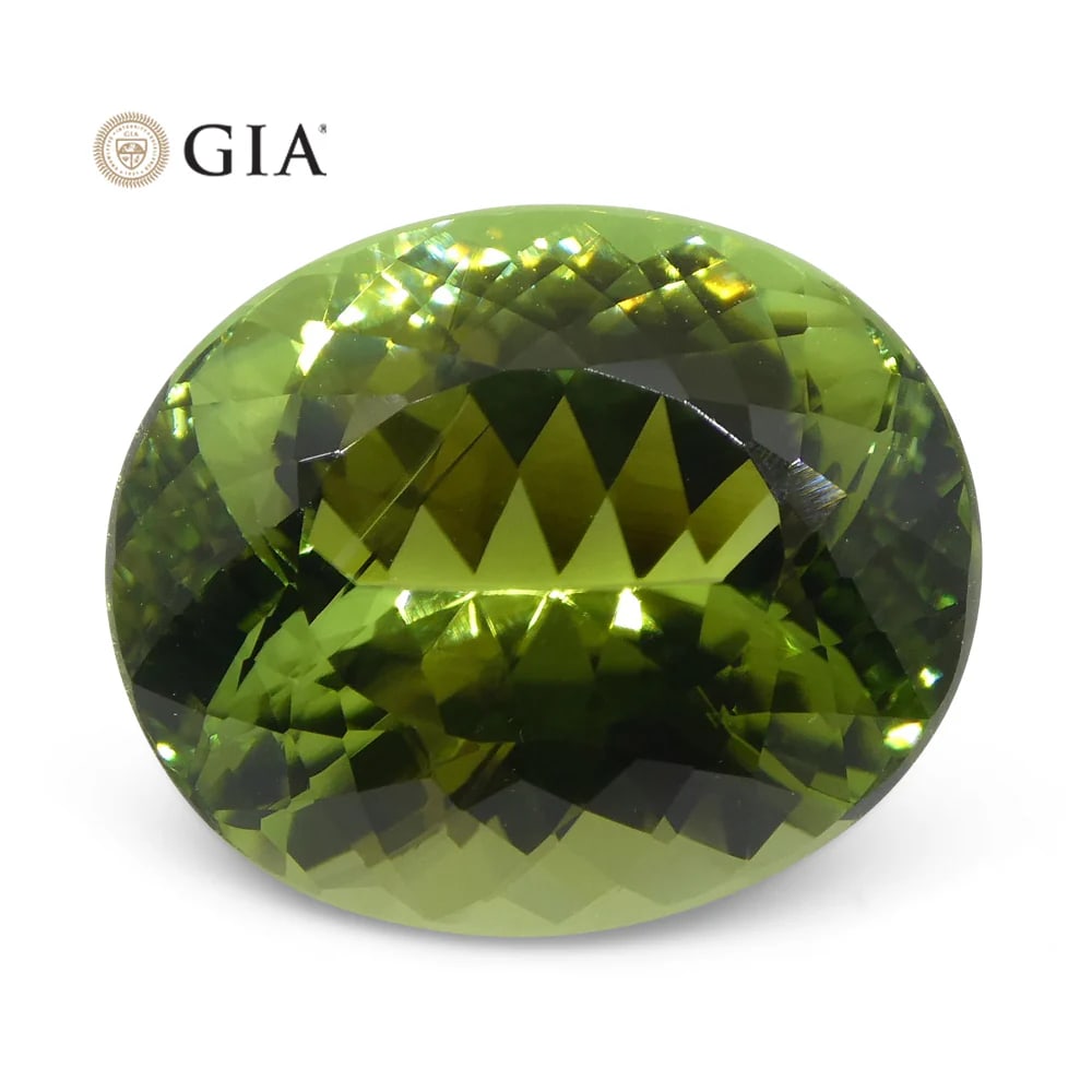 Large 9.30 Ct GIA Certified Natural Tourmaline: This Large VVS1 Eye Clean 9.30 Ct Parrot Green Tourmaline showcases a Brilliant Master Cut measuring 14.89 x 12.38 x 8.16 mm. This Tourmaline is a Work of Art! Don't miss out!! Treatment: None. Please