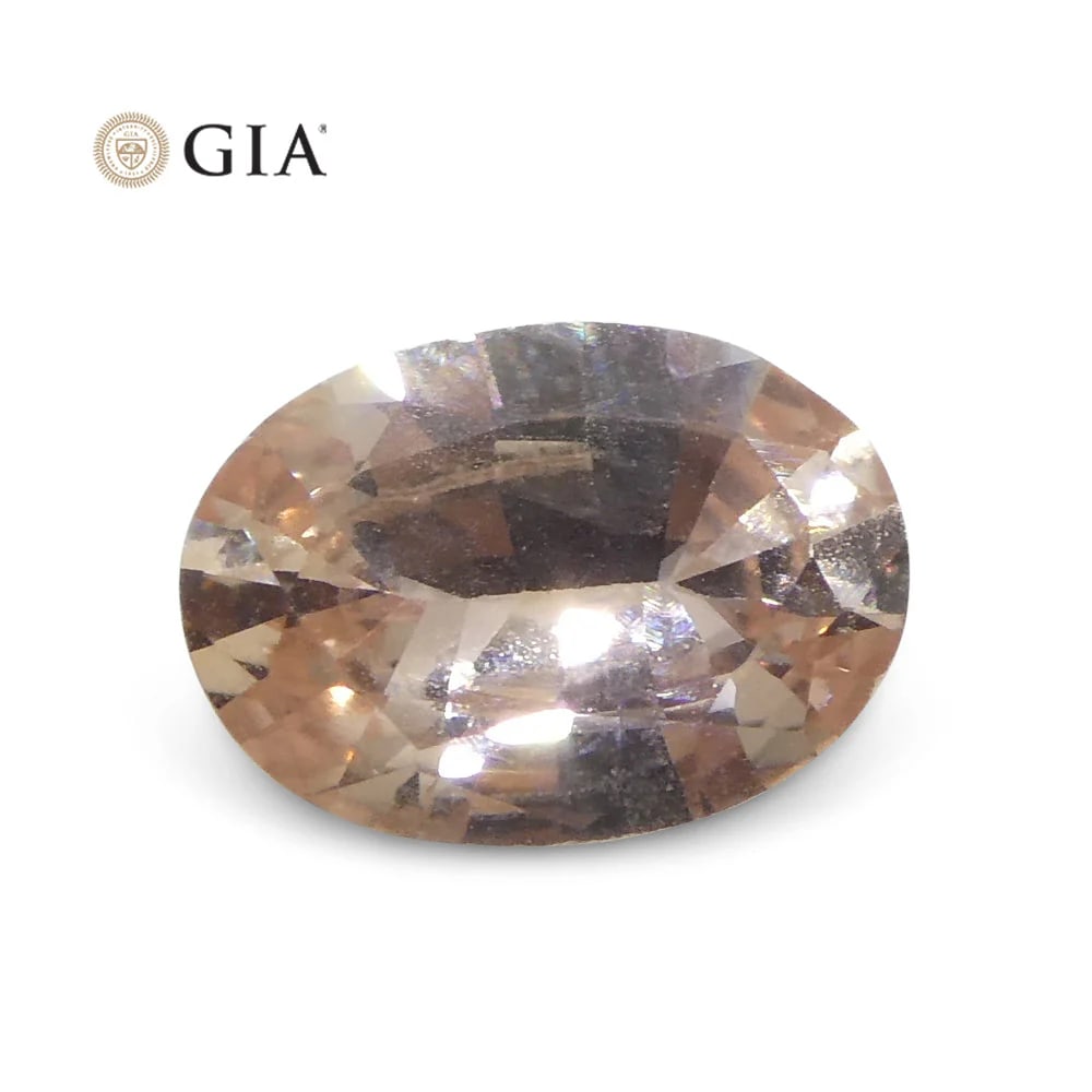 Amazing 0.77 Ct GIA Certified Natural Sapphire: Graceful 0.77 Ct Orangy Pink Padparadscha Sapphire is an oval brilliant cut measuring 6.92 x 4.95 x 2.77 mm. Reveals a soft tone and moderately strong saturation. Get ready for the compliments on this