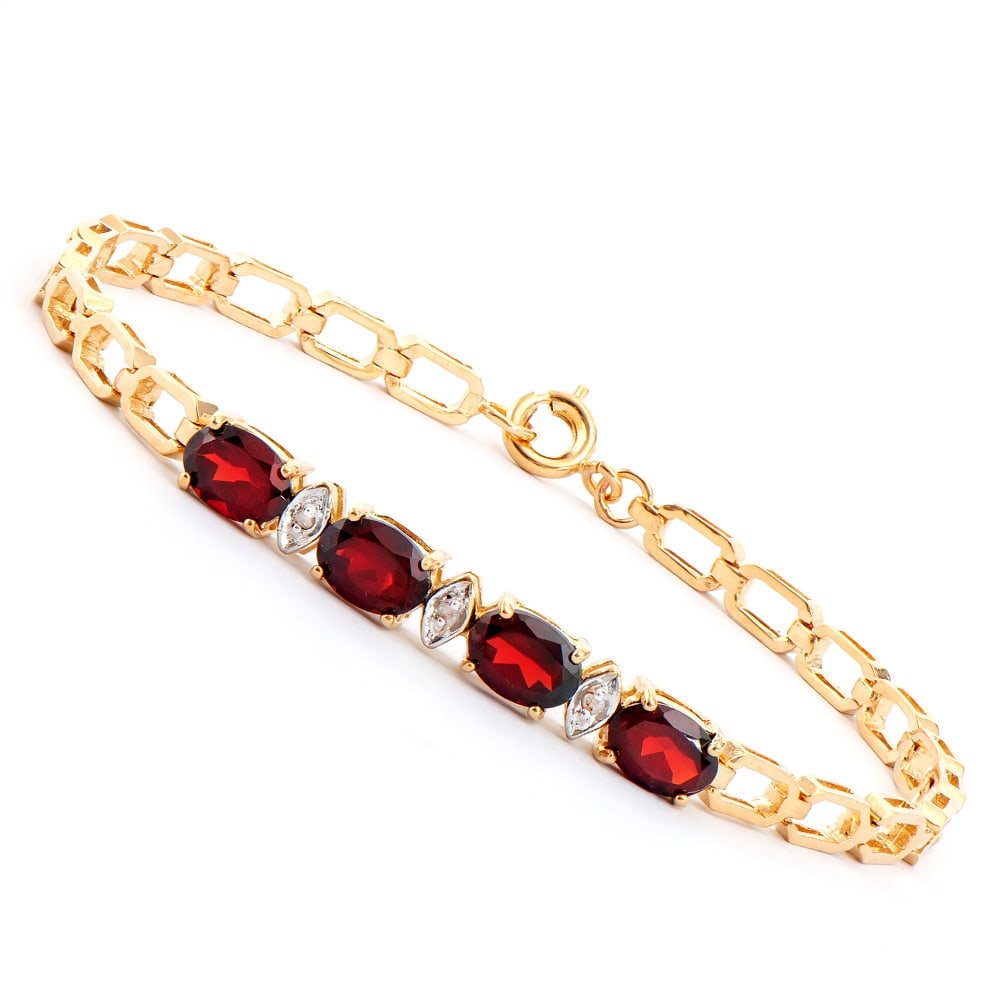 Plated 18KT Yellow Gold 3.50ctw Garnet and Diamond Bracelet: One Plated 18KT Yellow Gold 3.50ctw Garnet and Diamond Bracelet. (4) Garnet stones with a total weight of 3.50cts. (3) Diamonds with a total weight of 0.025cts with a color of I-J and clarity of I-3. 