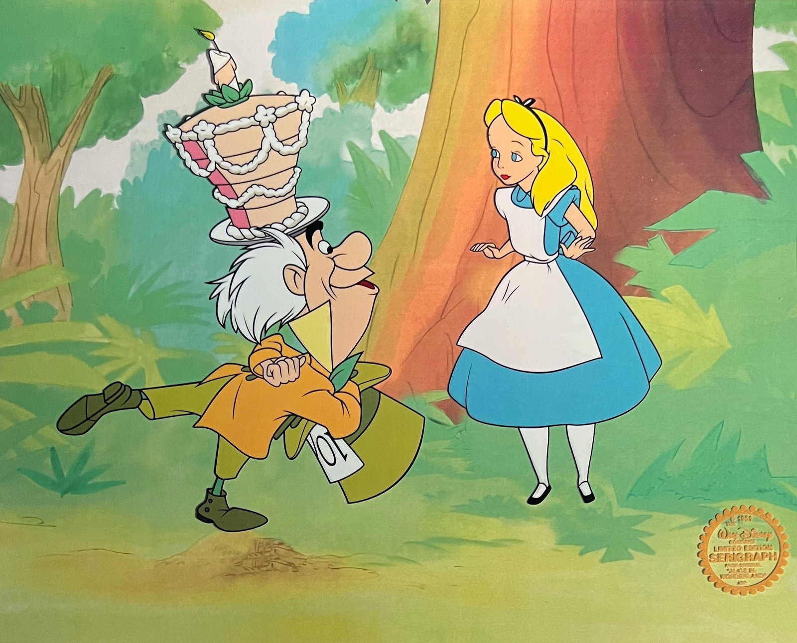 Disney ALICE IN WONDERLAND Sericel Animation Art: This is a Limited Edition Serigraph Cel of ALICE and the MAD HATTER from 1951 Walt Disney Studios – ALICE IN WONDERLAND. This cel is from the scene Its a Very Merry Un-Birthday to You. Disneys own a