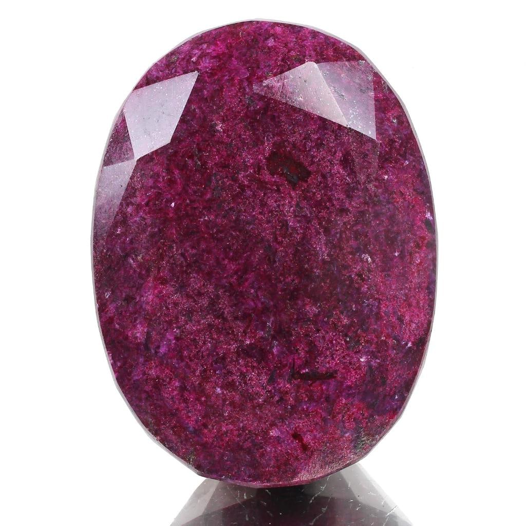 Magnificent Certified Museum Size 1660 Ct Natural Red Ruby Solitaire: Magnificent Huge 1660 Ct Certified Natural Red Ruby Solitaire. Fine oval cut measuring 70 x 51 x 405 mm. Has a vivid even red hue with a fine finish and polish. Species: Corundum. Natural opaque. Plea