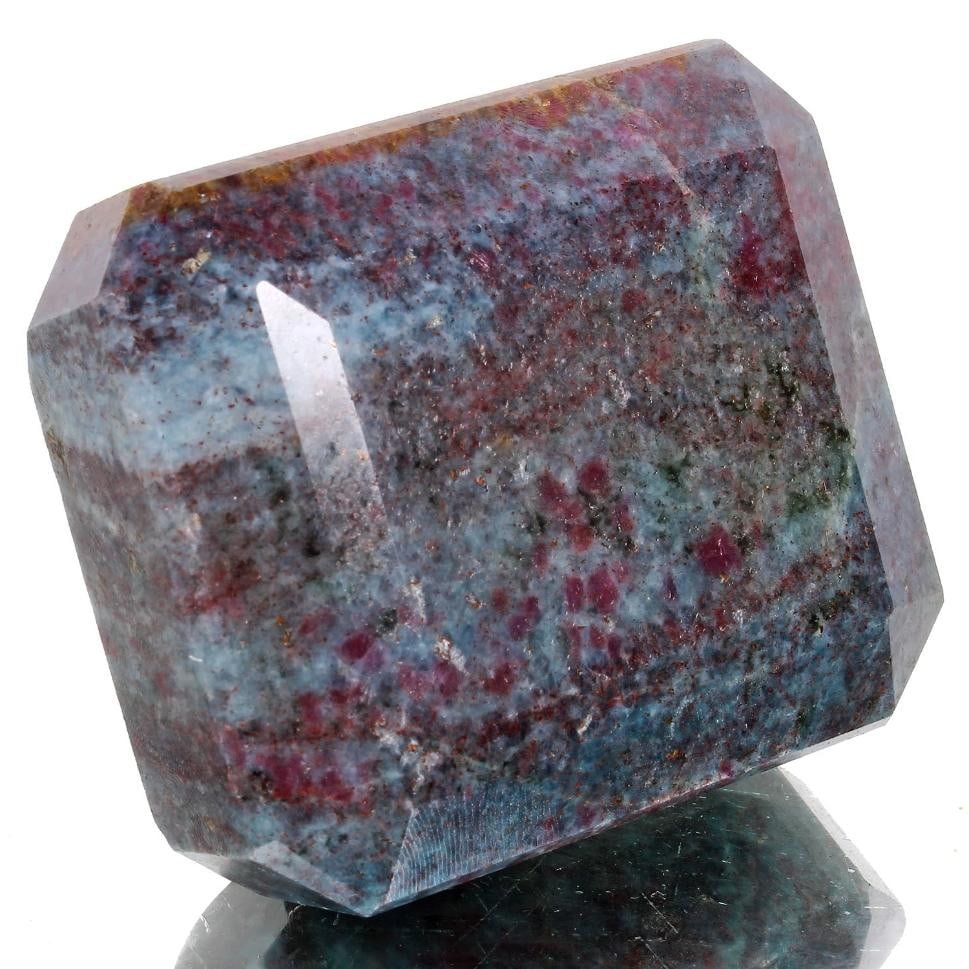 Huge Certified 2030 Ct Museum Size Natural Red Ruby Blue Kyanite Solitaire: Magnificent Huge 2030 Ct Certified Untreated Natural Red Ruby Blue Kyanite Solitaire. Fine Emerald Cut measuring 70 x 59 x 36 mm. It has a vivid even burgundy blue hue with a fine polish and high lust