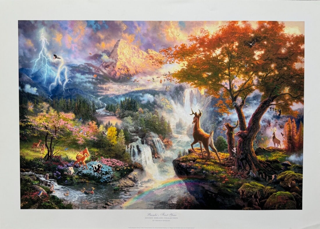 Thomas Kinkade BAMBI FIRST YEAR Hand Signed Limited Edition Lithograph: This is a hand signed lithograph by Thomas Kinkade titled Bambis First Year. This piece was hand signed by Thomas Kinkade himself. Image measures 12 inches x 18. Paper with border measures 16 inches