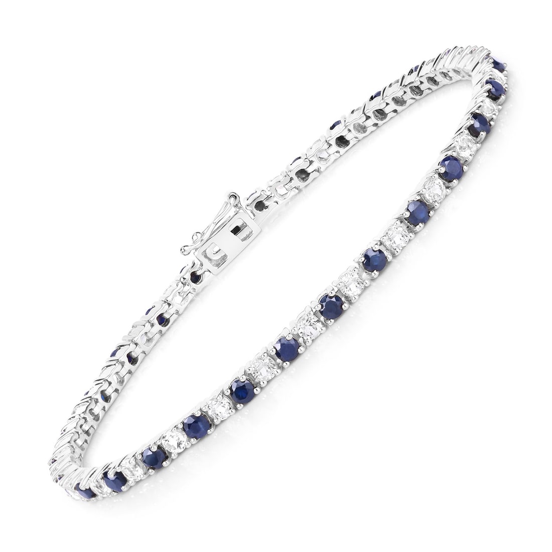 Rhodium Plated 6.87ctw Blue Sapphire and White Topaz Bracelet: twenty‑eight 3 mm round blue sapphires (3.36 ctw) and twenty‑seven 3 mm round white topaz stones (3.51 ctw) forms this rhodium‑plated .925 sterling silver ten