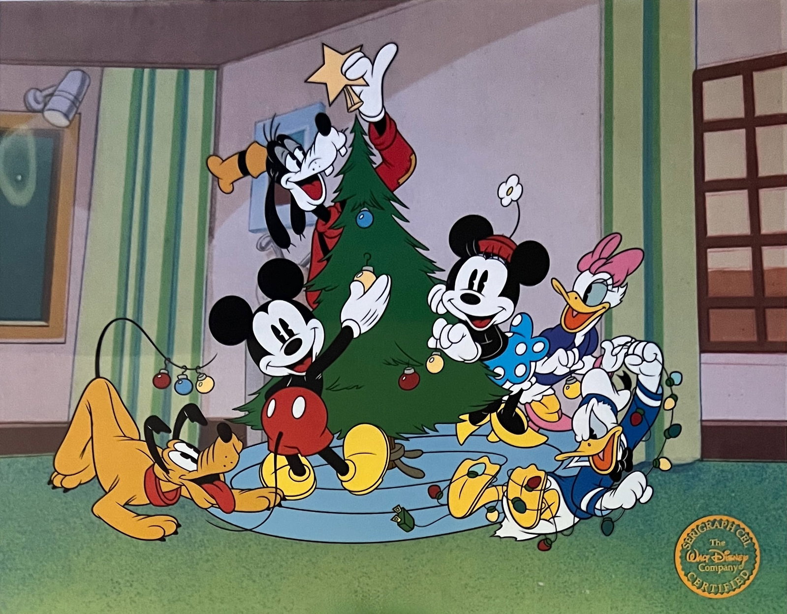 DISNEY CHRISTMAS Mickey Minnie Goofy Pluto Sericel Animation Art Cel: This is a limited edition serigraph cel of Disney Christmas. This sericel features Mickey Mouse, Minnie Mouse, Pluto, Goofy, Donald Duck and Daisy Duck celebrating the holiday. Disneys own artists hav