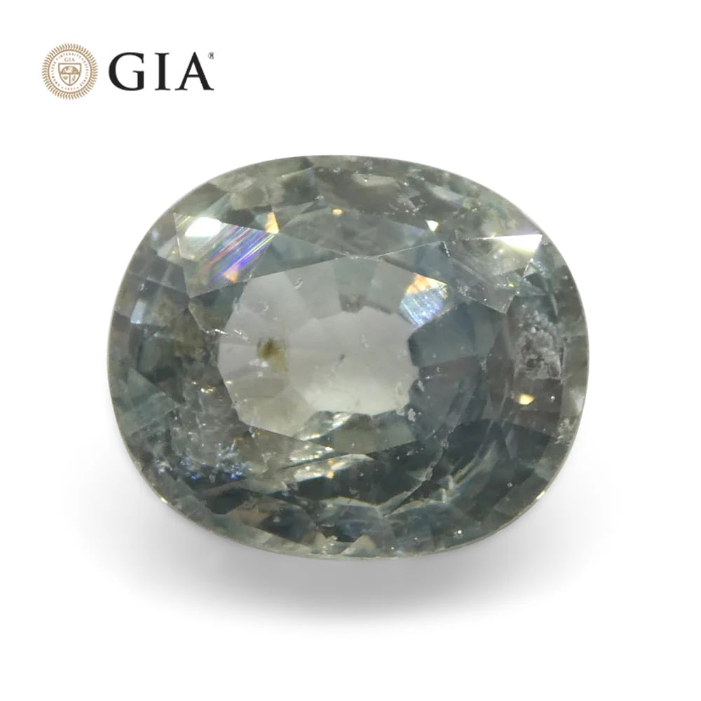 Elegant 3.04 Ct GIA Certified Natural Sapphire: Unique 3.04 Ct Greenish Blue Teal Sapphire is an oval brilliant cut measuring 8.91 x 7.47 x 5.11 mm. Reveals a stunning, light tone. Would make a perfect Centerstone for any jewelry piece! Origin: Tan
