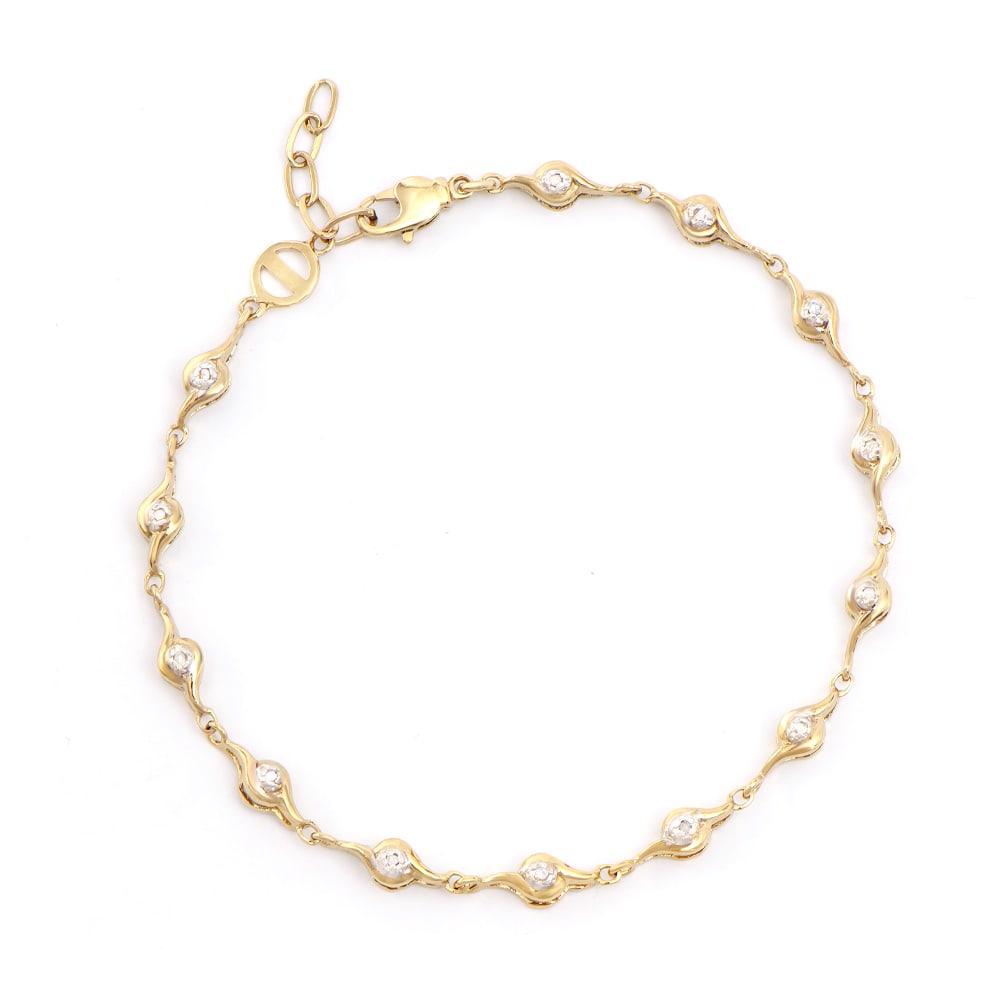 Plated 18KT Yellow Gold Diamond Bracelet: One Plated 18KT Yellow Gold Diamond Bracelet. Diamonds with a total weight of 0.10cts with a color of I-J and with a clarity of I3. Total weight of this bracelet is 4.65 grams of brass layered with 18