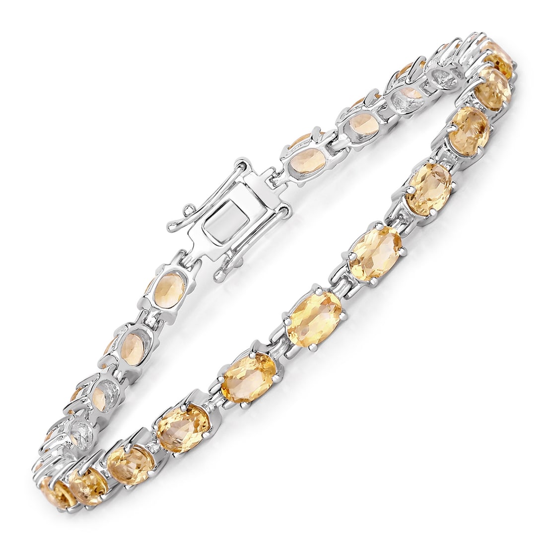 Rhodium Plated 9.03ctw Citrine Bracelet: Twenty one 6x4mm oval citrines (9.03ctw) forms this rhodium plated .925 sterling silver tennis bracelet, totaling 9.0ctw across 21 stones in classic prong settings. It measures 7.25 inches long with a