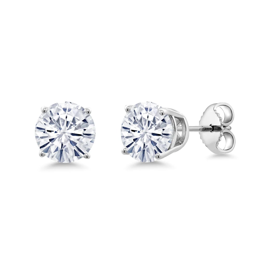 Sterling Silver 2.00ctw Moissanite Earrings: 2.00 CTTW Moissanite Stud Earrings ? 1.00 ct Each, GH Near?Colorless, Eye?Clean Clarity, Solid .925 Sterling Silver. Measurements: 6.5x6.5mm. Push backs.
