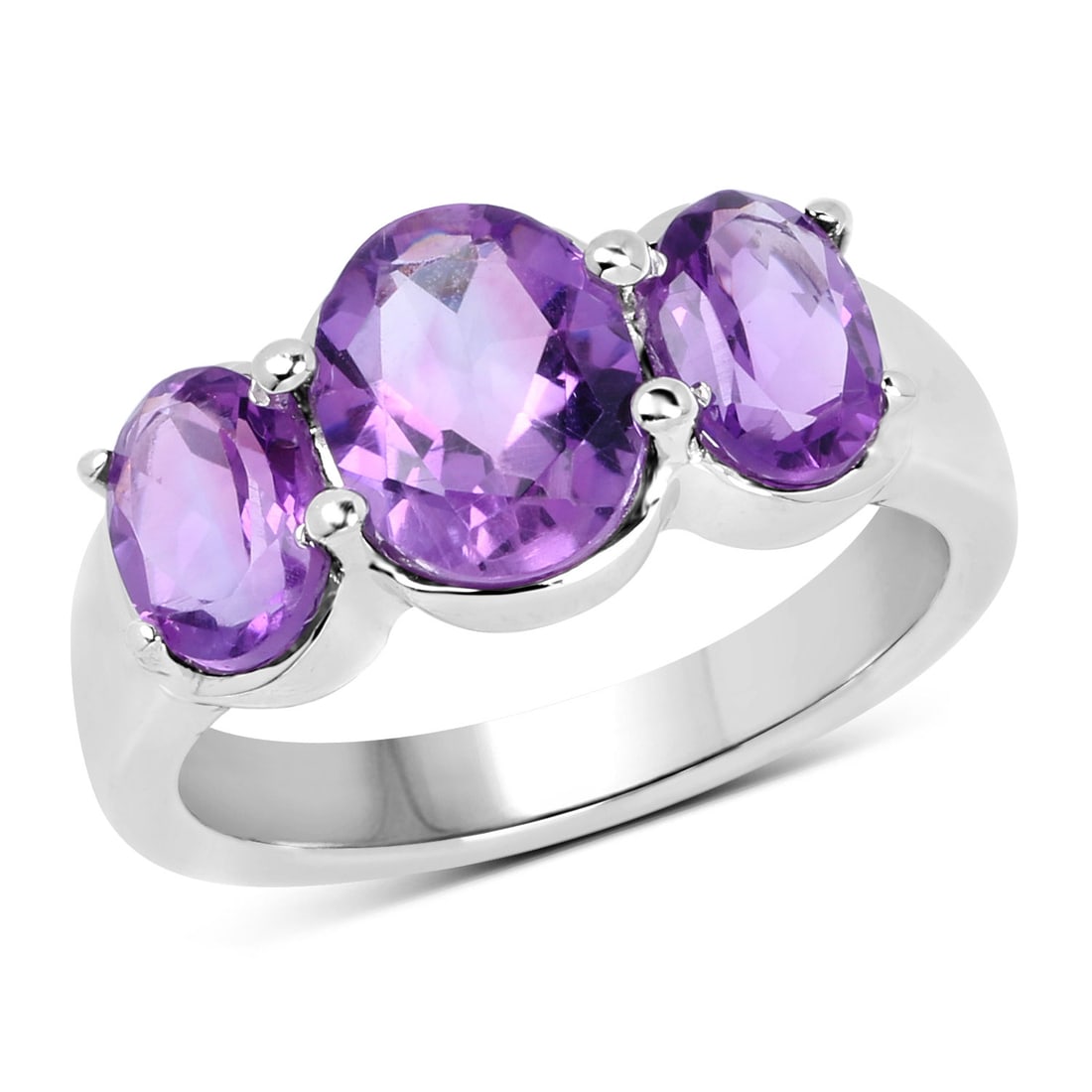 Sterling Silver 3.20ctw Amethyst Ring: A natural trio of oval amethysts defines this rhodium?plated .925 sterling silver three?stone ring, centered by a 9?7?mm oval (1.60?ctw) and paired with two 7?5?mm ovals (1.60?ctw). The design totals 
