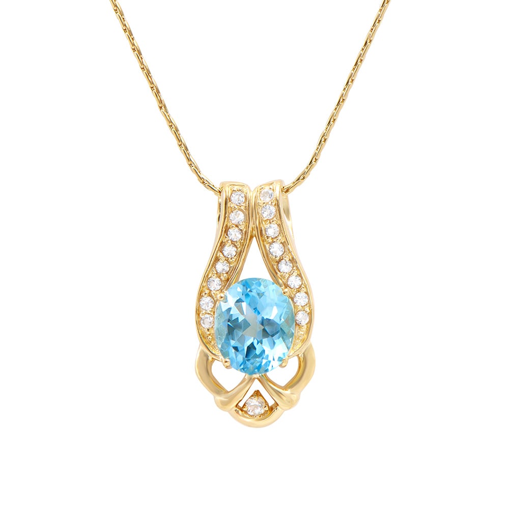 Plated 18KT Yellow Gold 6.00ctw Blue and White Topaz Pendant with Chain: One Plated 18KT Yellow Gold 6.00ctw Blue and White Topaz Pendant with Chain (1) Blue topaz stone with a total weight of 6.00cts. (17) white topaz stones with a total weight of 0.80cts. 7.65 grams of b