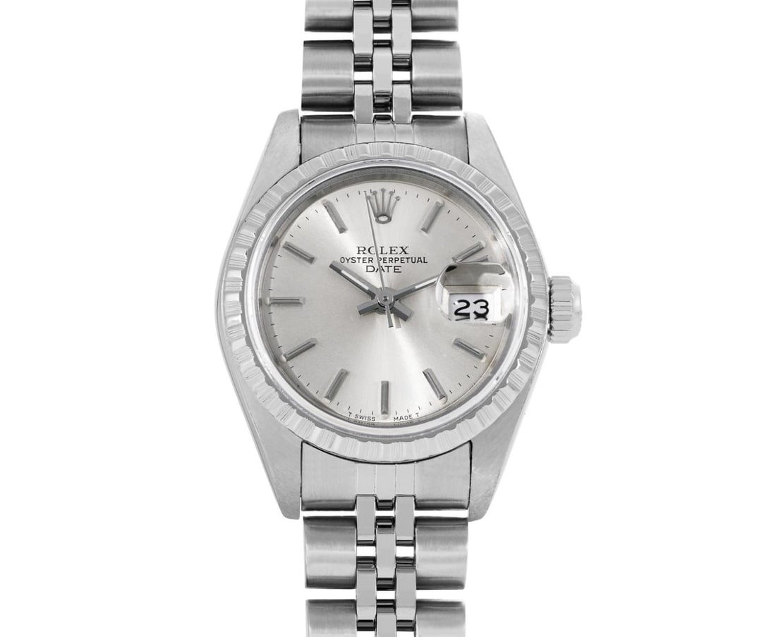 Rolex Ladies Stainless Steel Silver Index Quickset Date Watch Jubilee Band: This Lady Rolex Quickset Date watch features a silver dial with index hour markers and a custom sapphire crystal, with a magnified date window. The timepiece has Rolex stainless steel engine turn beze