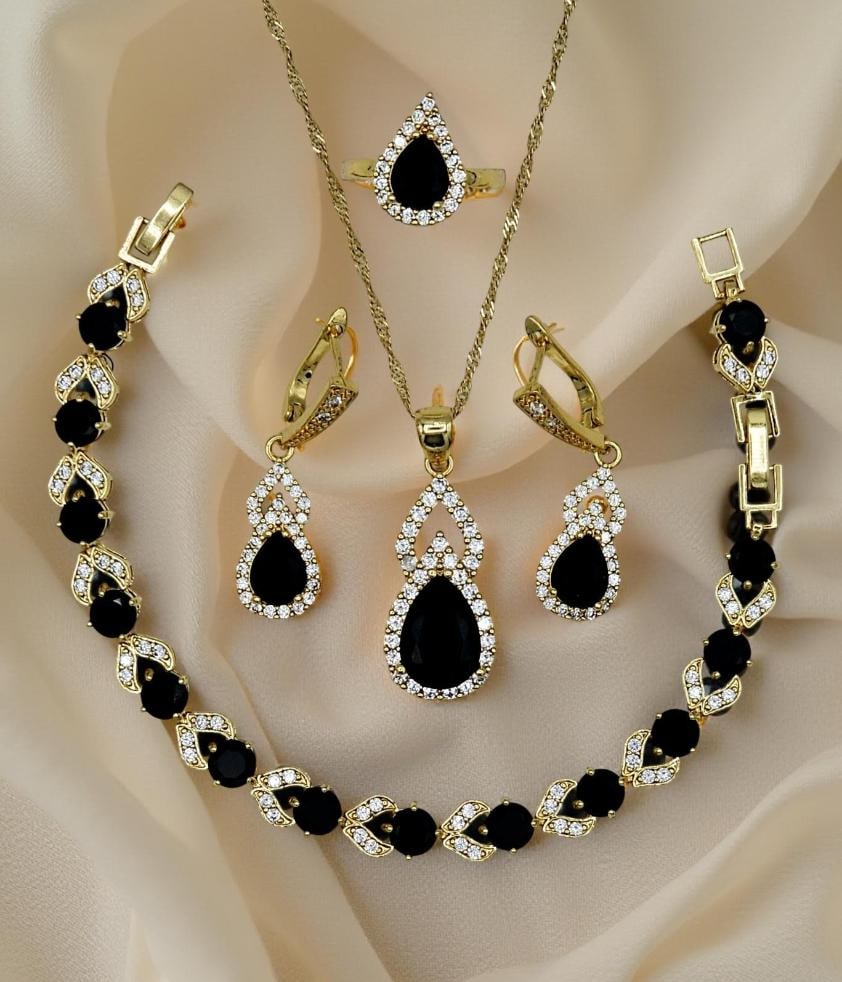 18 K Gold Plate Lab Simulated Black Diamond Jewelry Set: 18 Kt Gold Plate 4 Piece Lab Simulated Black Diamond Jewelry Set. These Lab Faceted Gemstones Are Eye Clean. They burst out with an flashing electric sparkle and a fine high polished mirror like hue. 