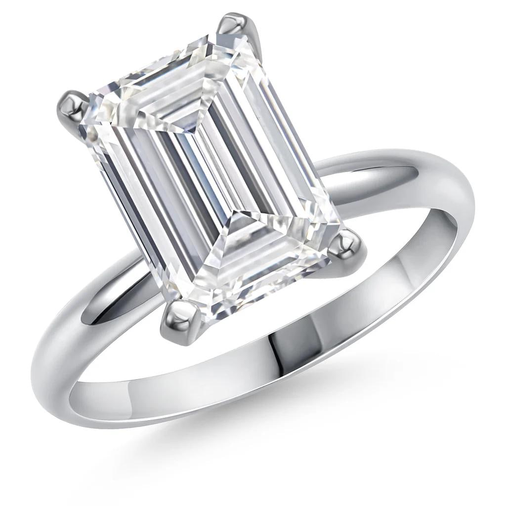 14KT White Gold 5.00ct Lab Grown Diamond Ring: Crafted in solid 14K white gold, this elegant design showcases a single emerald?cut lab?grown diamond measuring 12 x 8 mm and weighing an impressive 5.00 carats. Securely set in a classic 4?prong moun