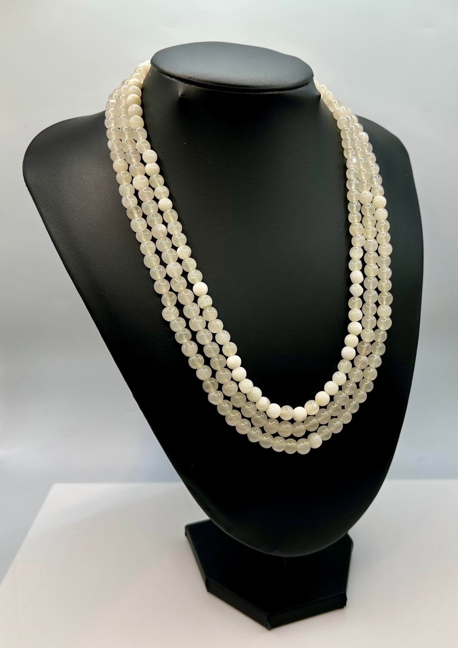 Stunning 489 Cttw 3 Strand Natural Moonstone Necklace: Stunning 489 Cttw. Mined From The Earth 3 Strand Natural?Moonstone Necklace. These Finely Polished Pearlescent Beads are the highly desired Luminescent White Pearl In Color and measure appox. 7 mm. ne