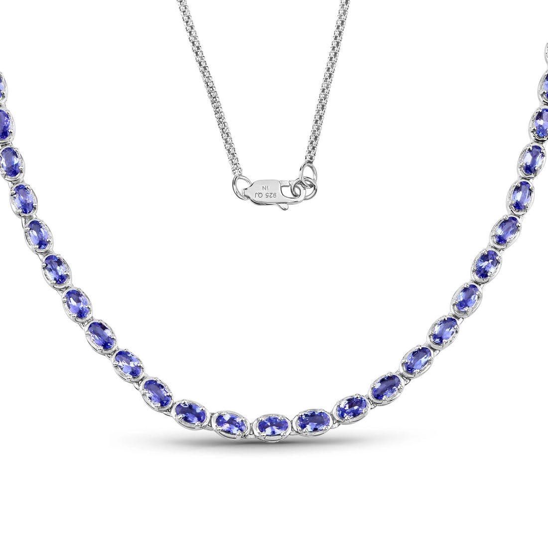 Sterling Silver 10ct Tanzanite Necklace: One Sterling Silver 10ct Tanzanite Necklace. (53) tanzanite stones with a total weight of 10cts. Total length of this necklace is 18 inches.