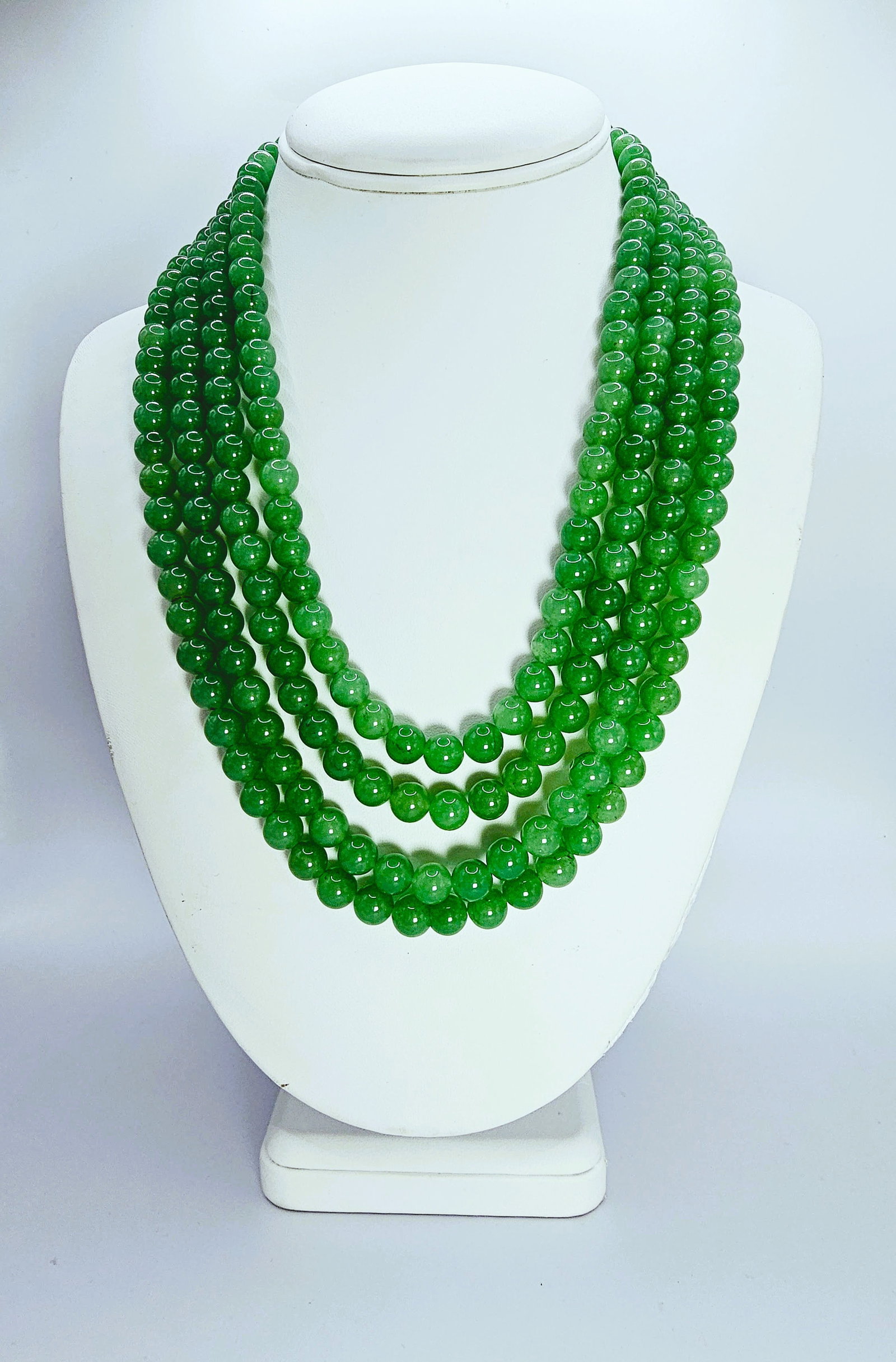 Beautiful 890 Cttw Genuine Emerald 4 Strand Necklace: Beautiful Natural 890 Cttw. Mined From The Earth 4 Strand Emerald Necklace. These fine polished beads are approx 8.5 mm. and are near perfect round. The neck size is adjustable from as small as 18 " t