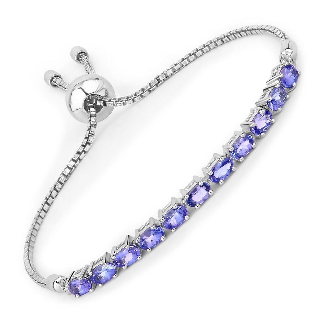 Plated Rhodium 2.29ctw Tanzanite Bracelet: This rhodium?plated .925 sterling silver bolo bracelet showcases eleven natural oval?cut tanzanites, each 5?3?mm and prong?set to highlight their vivid violet color, totaling 2.29 carats. Designed wit