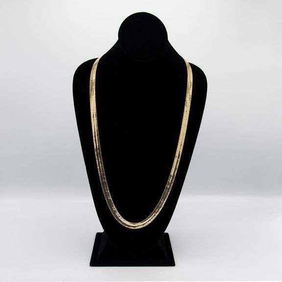 Huge 43.5 Gram 14 Kt Gold Plated Herringbone Necklace: Huge 43.5 Gram 14 Kt Gold Plated Herringbone Necklace. This fine classic herringbone necklace is a solid Italian cut. 24 inches long and a healthy 8.5 mm. wide. It shows like solid gold without the so
