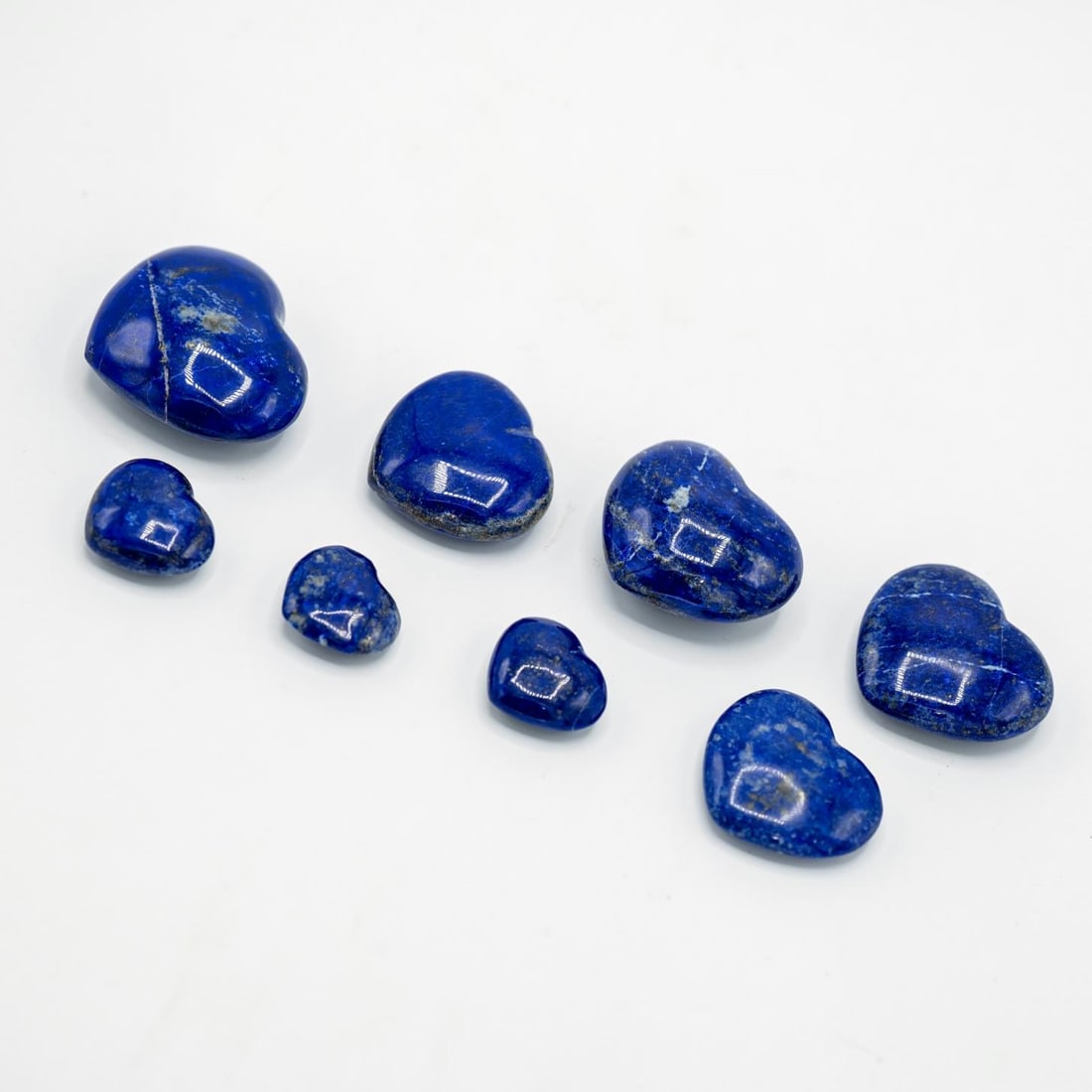 8 Piece Natural Blue Lapis Lazuli Healing Stones: These 8 Natural Blue Lapis Lazuli Are Highly Polished Heart Cabochon Cuts Weighing 652 Cttw. These blue lapis lazuli also has the highly desired Gold Pyrite Accents. Blue lapis lazuli is treasured for