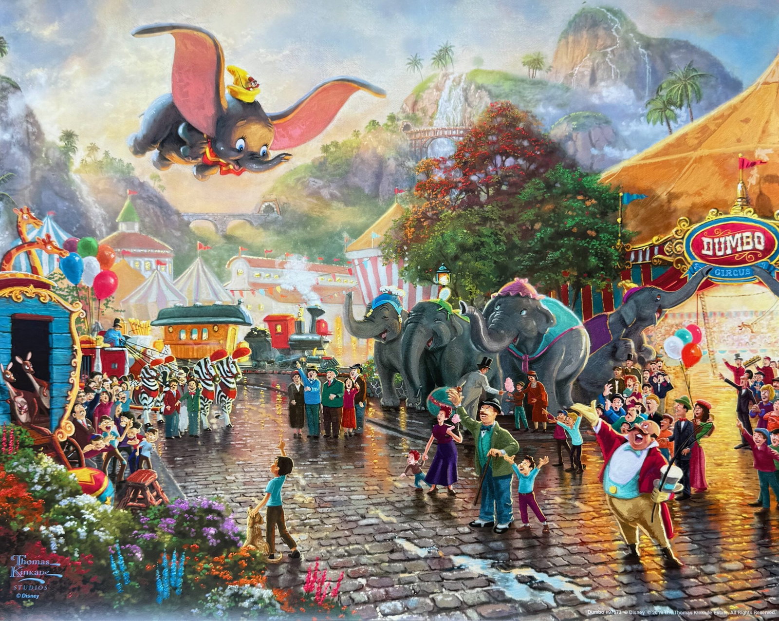 Thomas Kinkade Disney DUMBO Lithograph: This print is from Thomas Kinkade Studios titled Dumbo. Measures 11 inches x 14. Comes unsigned, bears a Thomas Kinkade Studios seal. Published in 2019 under license. Comes with a publishers certifica