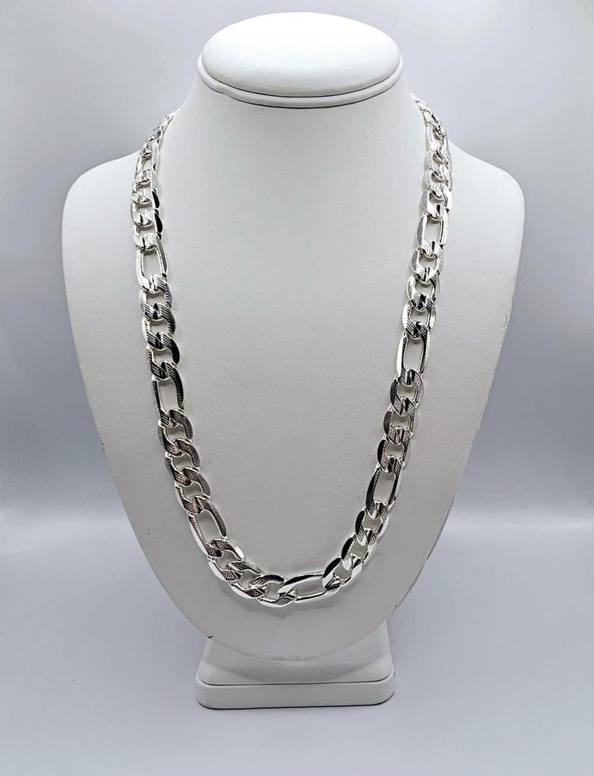 Huge 85.4 Gram.925 Silver Plated Italian Figaro Link Necklace: Strong and durable heavy Tri-Layered .925 Sterling Silver Italian Figaro Link Necklace weighing 85.4 Grams. This High Quality Silver Necklace looks and wears just like solid silver and It will not fad