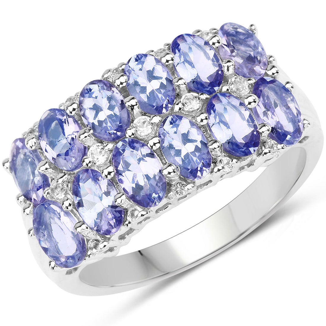 Plated Rhodium 3.16ctw Tanzanite and White Topaz Ring: This rhodium?plated .925 sterling silver cluster ring showcases 3.16 ctw of natural gemstones, led by twelve 5?3 mm oval tanzanite's totaling 3.00 ctw, heat?treated for vivid violet color. Fifteen nat