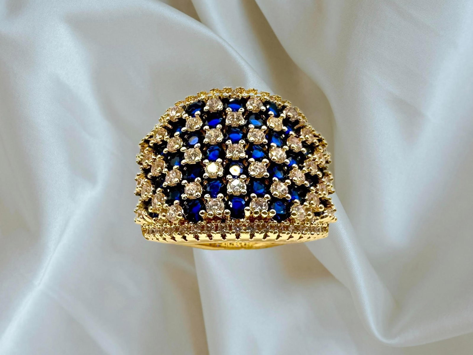 14 Kt Yellow Gold Plate 5.75 Cttw Simulated Diamond Midnight Blue Sapphire Ring: Stunning 14 Kt Yellow Gold Plate 5.75 Cttw Simulated Diamond Midnight Blue Sapphire Ring. These simulated Midnight Blue Sapphires and Simulated Diamonds are all eye-clean. They are meticulously mounte