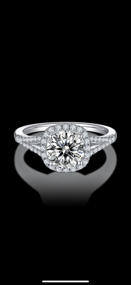 Sparkling 3 Ct VVS1 White F-G Fire Moissanite Ring: This Fire Moissanite is a VVS1 Brilliant Round Cut. The Color is G-H with a clarity of VVS-1. Measuring approx. 9 mm. This Fire Moissanite is near flawless and bursting out with a full spectrum of col