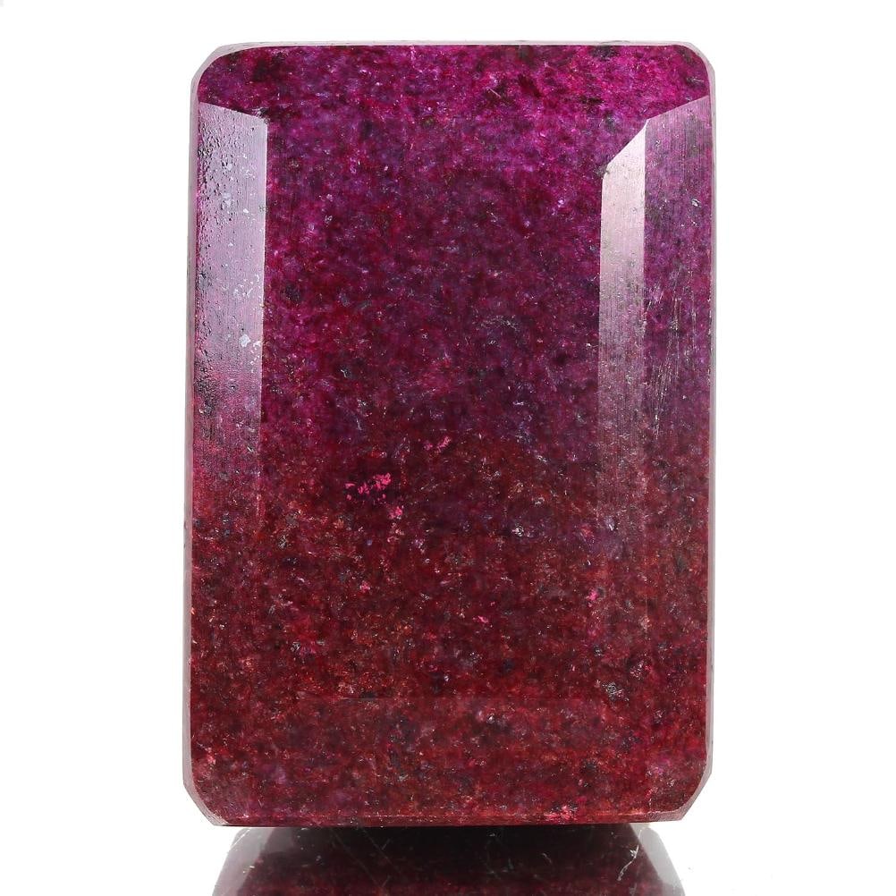 Magnificent Certified Museum Size 1880 Ct Natural Emerald Cut Red Ruby Solitaire: Magnificent Huge 1880 Ct Certified Natural Red Ruby Solitaire.? It is an emerald cut measuring 70 x 46 x 36 mm. This Ruby displays a vivid red even hue with a fine finish and polish. Species: Corundum