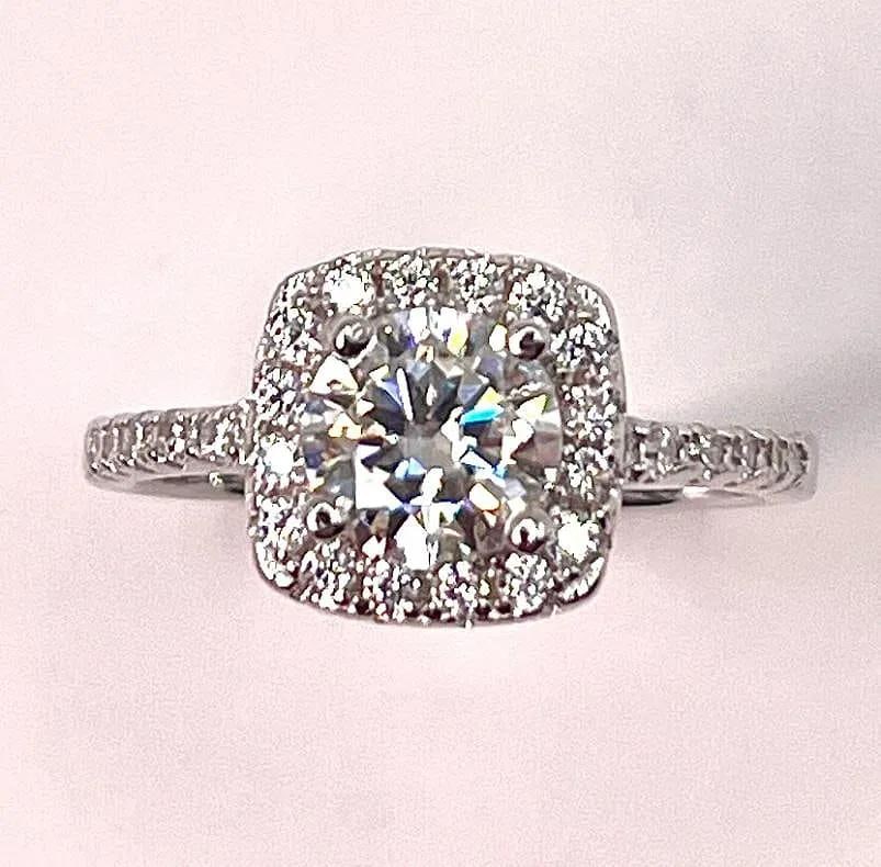14 Kt White Gold Plate 2.75 Ct White Lab Simulated Diamond Ring: This 2.75 Ct Lab Simulated Diamond Center-Stone Solitaire is a Brilliant Round Cut Measuring 7.8 mm. The Color is Ice White and it is eye clean . This high quality solitaire is bursting out with a ful
