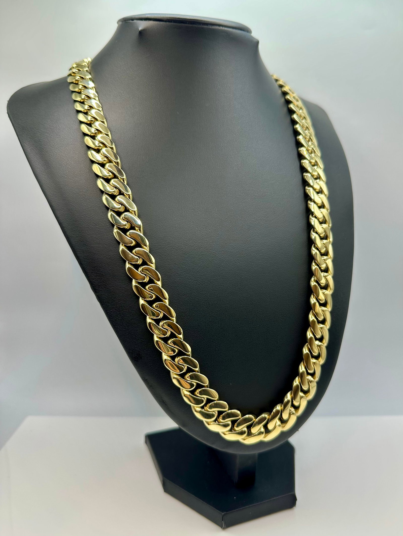 Huge 196 Grams 14 Kt Yellow Gold Plate Cuban Curb Link Chain Necklace: Huge 196 Grams 14 Kt Yellow Gold Plated Cuban Curb Link Chain Necklace. This top notch Cuban Curb Link Necklace Is Just Like The Pros Wear. It Measures A Stealth 14 mm Wide and is Secured with a Doubl