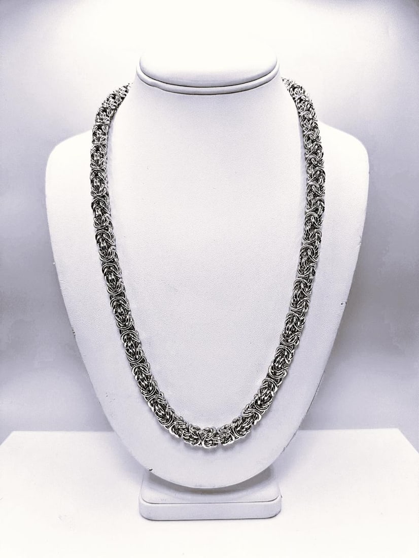 125.4 G 18 Kt White Gold Plated Diamond Cut Byzantine Chain: This Huge 125.4 Gram 18 Kt White Gold Plated Byzantine Chain Necklace It Is A Solid Diamond Cut. 24" Long and a Healthy 8 mm. Wide. This fine? Byzantine detailed Diamond Cut Chain Necklace Goes With A