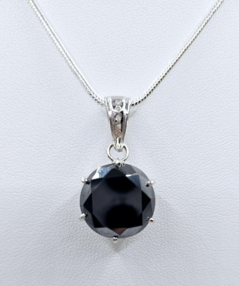 Huge Rare 14.15 Ct Simulated Black Diamond Pendant Necklace: Impressive Huge Rare 14.15 Ct 14 Kt White Gold Plated Lab Simulated Black Diamond Pendant w/Chain. This Huge Rare 14.15 Ct Black Lab Simulated Diamond Round Brilliant Round Cut Measuring 16 mm. It is?